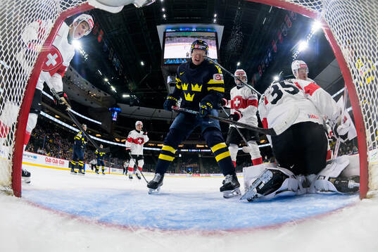 Milton Gästrin of Sweden gets a stick in his face