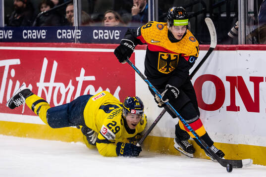 Casper Juustovaara Karlsson of Sweden and Dustin Willhoft