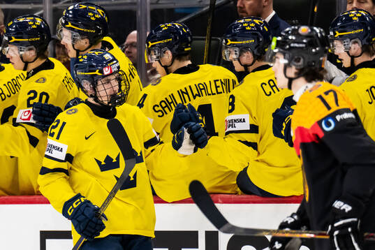 Viggo Björck of Sweden celebrates with team mates
