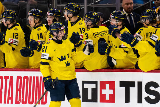 Viggo Björck of Sweden celebrates with team mates