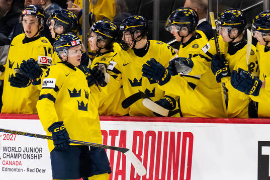 Felix Öhrqvist of Sweden celebrates with team mates