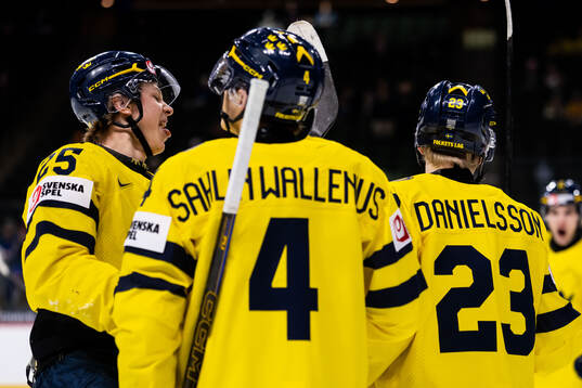 Liam Danielsson of Sweden celebrates with Eddie Genborg and