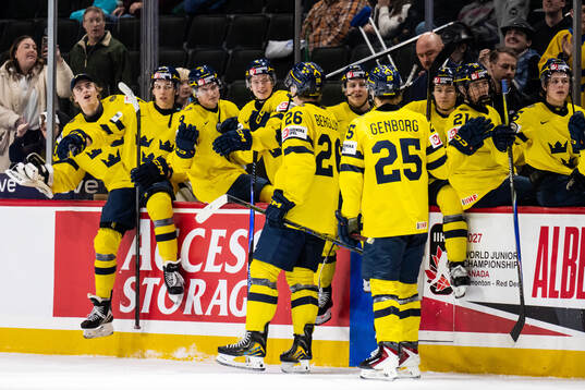 Jack Berglund and Eddie Genborg of Sweden celebrate with
