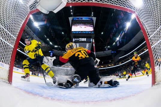 Liam Danielsson of Sweden scores the 1-7 goal behind