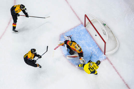 Liam Danielsson of Sweden scores the 1-7 goal behind
