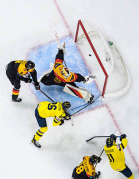Jack Berglund of Sweden scores the 1-8 goal behind