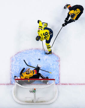 Jack Berglund of Sweden scores the 1-3 goal behind