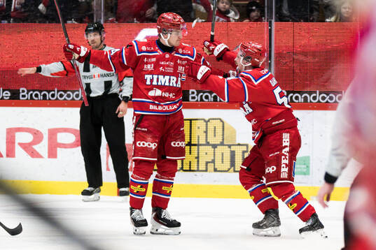 Timrås Sebastian Hartmann och Jonathan Dahlén jublar