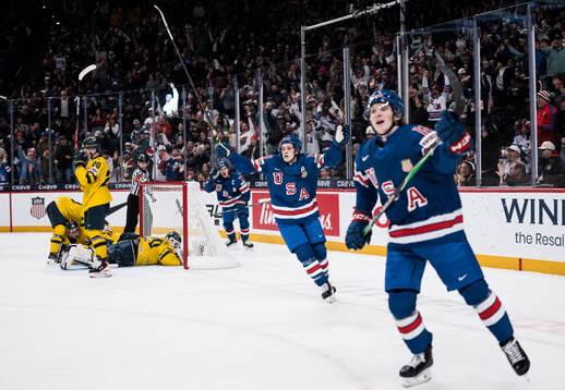 James Hagens and Will Zellers of USA celebrates