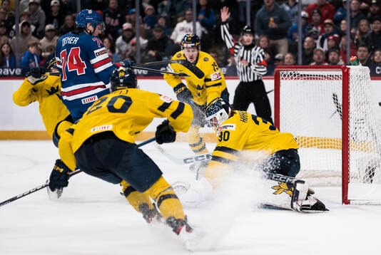 Brodie Ziemer of USA and goaltender Love Härenstam of