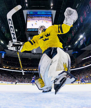 Goaltender Love Härenstam of Sweden trips