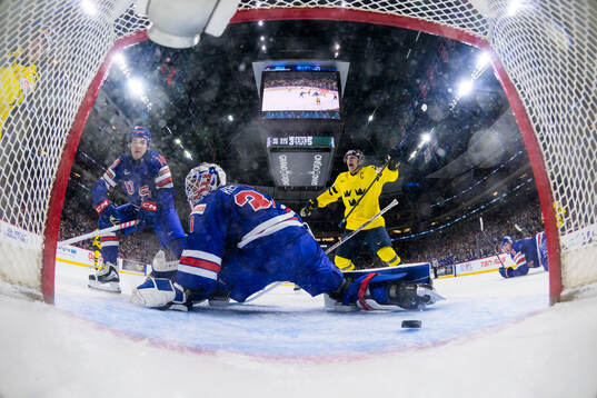 Jack Berglund of Sweden celebrates when Ivar Stenberg of