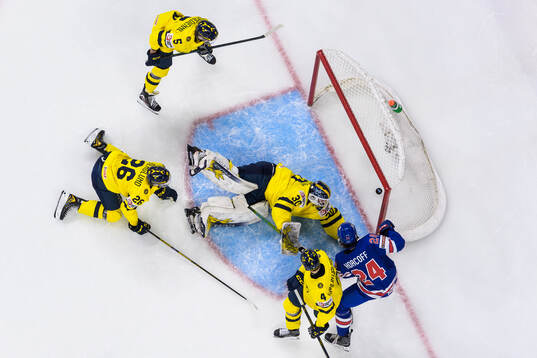 Goaltender Love Härenstam of Sweden lets in the 1-3 goal