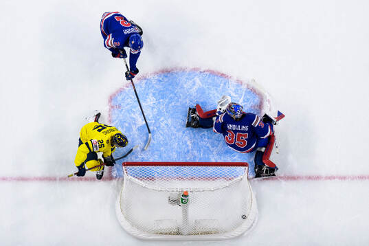 Eddie Genborg of Sweden scores the 1-5 goal behind