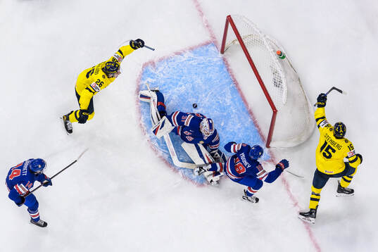 Jack Berglund and Ivar Stenberg of Sweden celebrate the 3-6