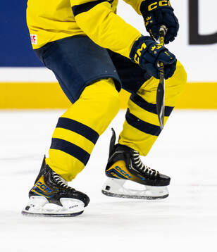 Skates and stick of Viggo Björck of Sweden at warm-up