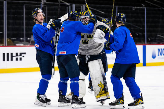 Eric Nilson, Ivar Stenberg and goaltender Love Härenstam