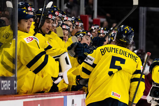 Sascha Boumedienne of Sweden celebrates with team mates
