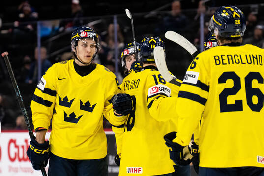 Sascha Boumedienne of Sweden celebrates with team mates