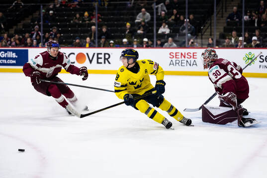 Victor Eklund of Sweden against Rolands Naglis and