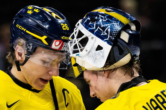 Jack Berglund and goaltender Love Härenstam of Sweden