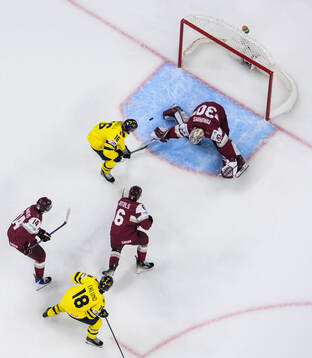 Anton Frondell of Sweden scores the 1-0 goal behind