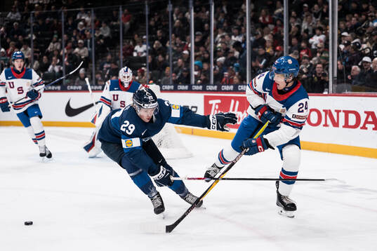 Jasper Kuhta of Finland and Will Horcoff of USA