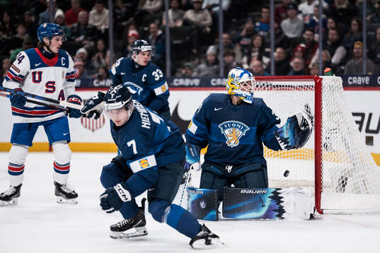 Goaltender Petteri Rimpinen of Finland lets in the 2-1 goal