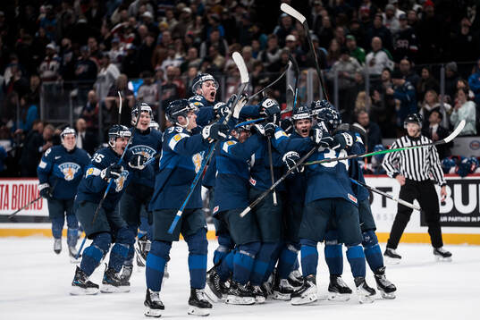 Players of Finland celebrate the 3-4 goal