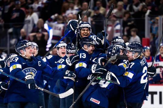 Players of Finland celebrate the 3-4 goal by Arttu Välilä