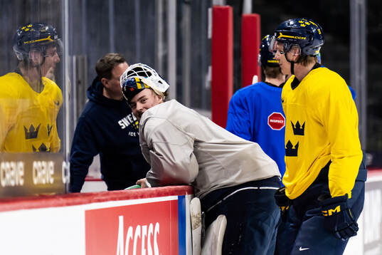 Goaltender Love Härenstam and Jack Berglund of Sweden at a