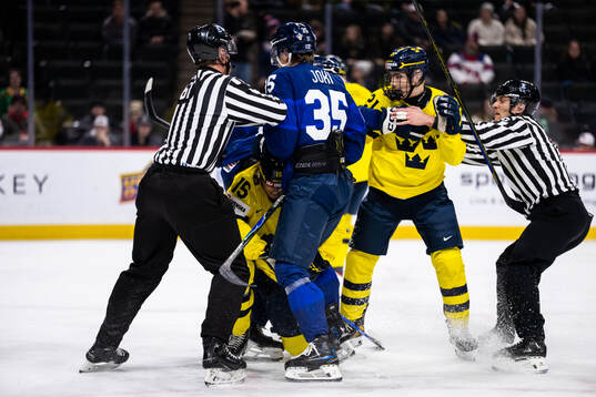 Ivar Stenberg and Viggo Björck of Sweden against Atte Joki