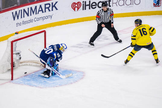 Anton Frondell of Sweden scores the game winning goal