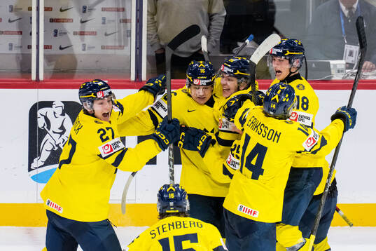 Anton Frondell of Sweden celebrate with teammates