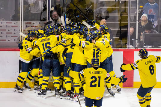 Players of Sweden celebrate