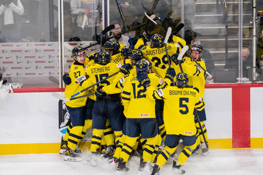 Players of Sweden celebrate