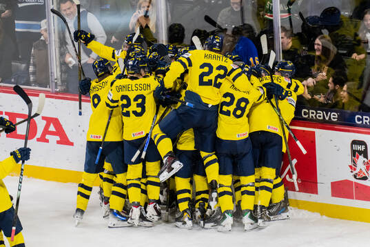 Players of Sweden celebrate