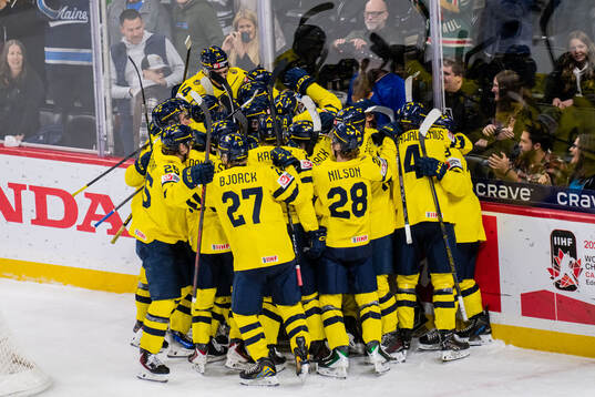 Players of Sweden celebrate