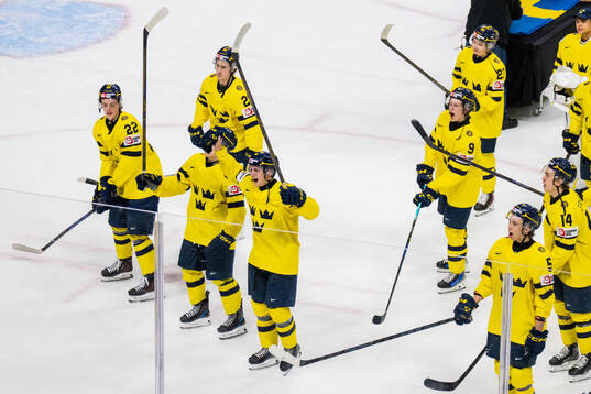 Players of Sweden celebrate