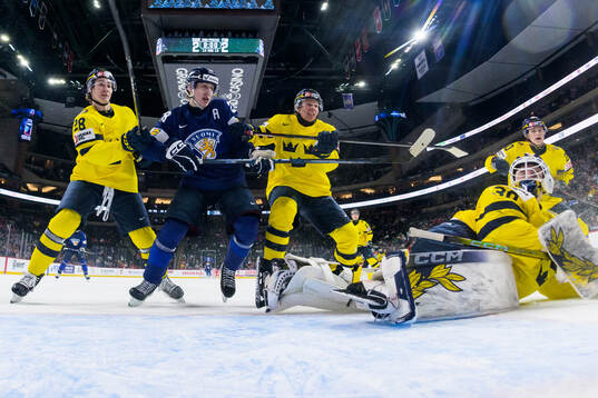 Eric Nilson, Milton Gästrin and goaltender Love Härenstam