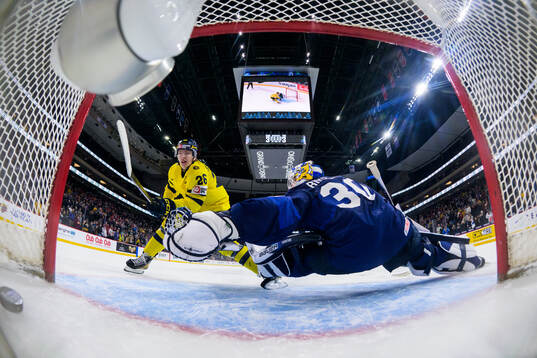 Jack Berglund of Sweden scores a goal in penalty shoot-out