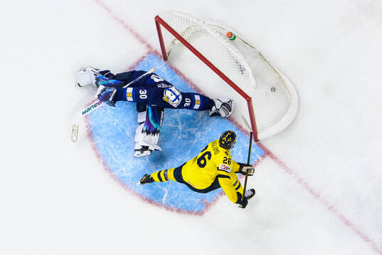Jack Berglund of Sweden scores a goal in penalty shoot-out