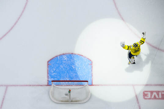 Goaltender Love Härenstam of Sweden celebrates