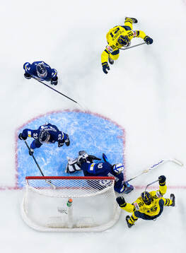 Viggo Björck and Ivar Stenberg of Sweden celebrate the 3-3