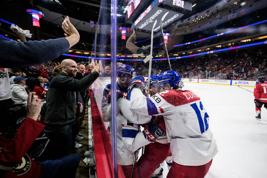 Adam Benak of Czech Republic celebrates with teammates