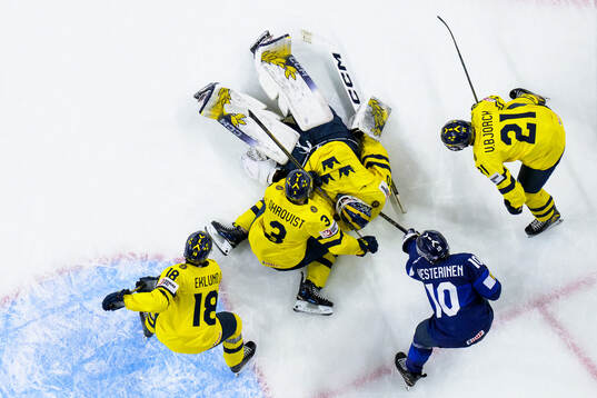 Roope Vesterinen of Finland challenges Victor Eklund, Felix