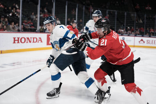 Daniel Nieminen of Finland and Cole Reschny of Canada