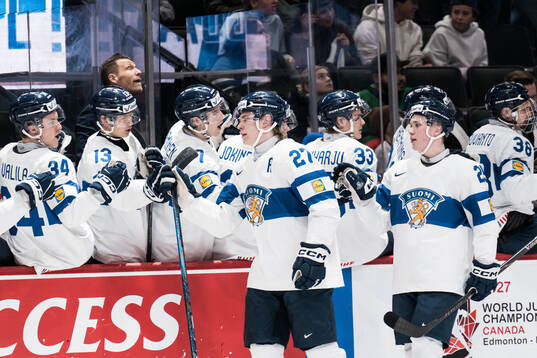 Julius Miettinen and Lasse Boelius of Finland celebrates
