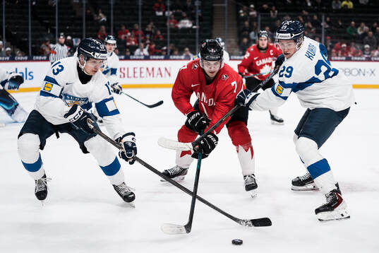 Veeti Väisänen of Finland and Michael Misa of Canada and