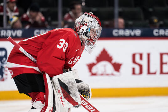 Goaltender Carter George of Canada